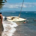 First responders tow sailboat back to sea